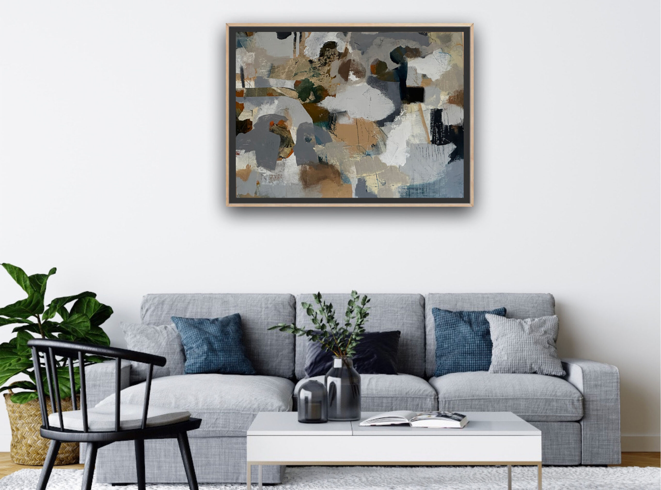A Dance with Enchanted Winds painting framed on wall above a couch